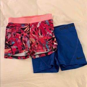 2 pair of Nike pros